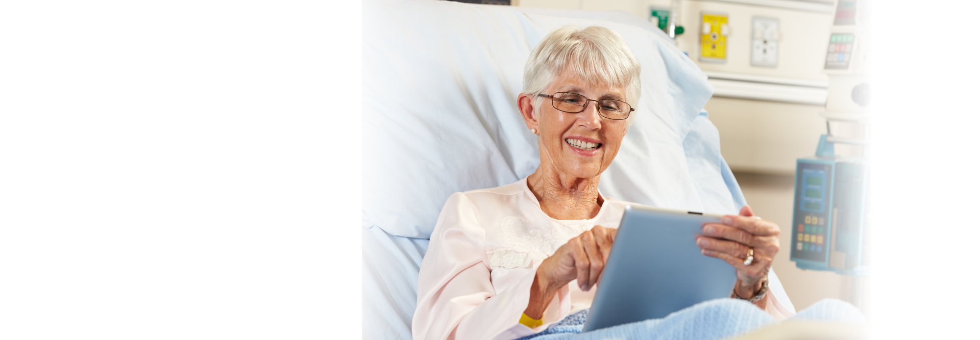 elderly woman using tablet